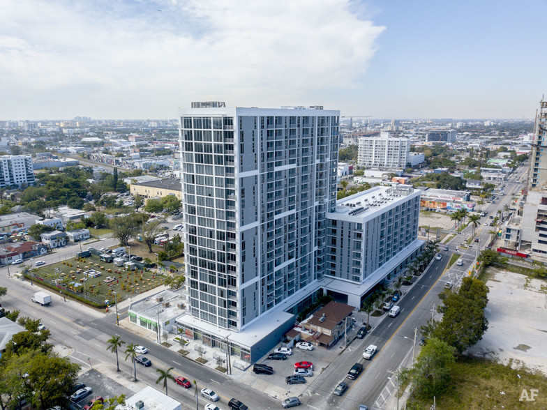Midtown Miami apartment building aerial view with road and city views.